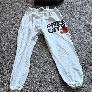 freecity White Track Joggers with Black Logo and Rust Accent